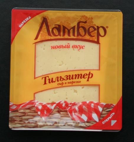 Упаковка нарезки сыра Тильзитер